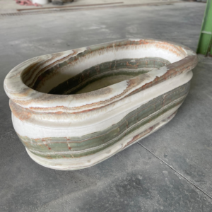 Onyx Bath tub with green veining for high end project in USA.